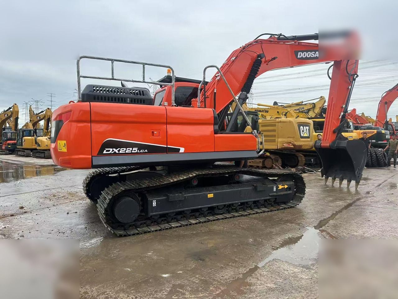2024 Doosan DX225LCA crawler excavator, rear three-quarter view 2024 Doosan DX225LCA crawler excavator, rear three-quarter view