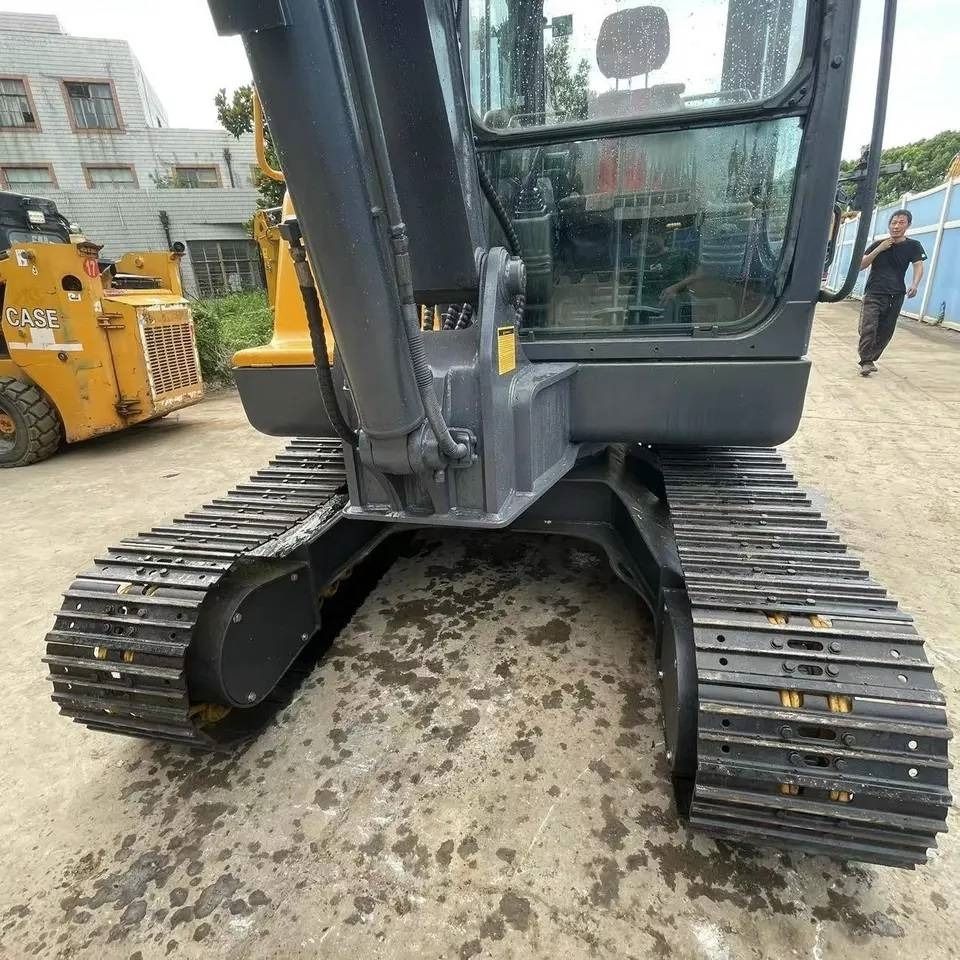 2023 Volvo EC55D mini excavator, front view of cab and tracks 2023 Volvo EC55D mini excavator, front view of cab and tracks