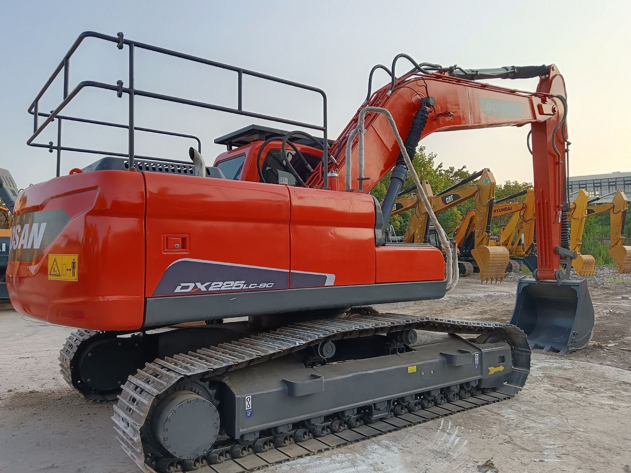 2024 Doosan DX225LC-9C crawler excavator, rear three-quarter view 2024 Doosan DX225LC-9C crawler excavator, rear three-quarter view