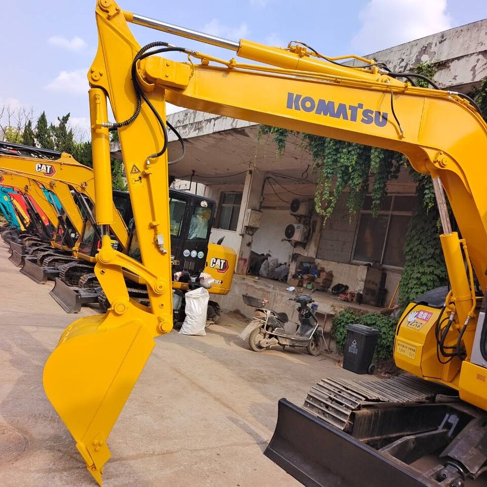 2024 Komatsu PC78US mini excavator, side view of boom and bucket 2024 Komatsu PC78US mini excavator, side view of boom and bucket