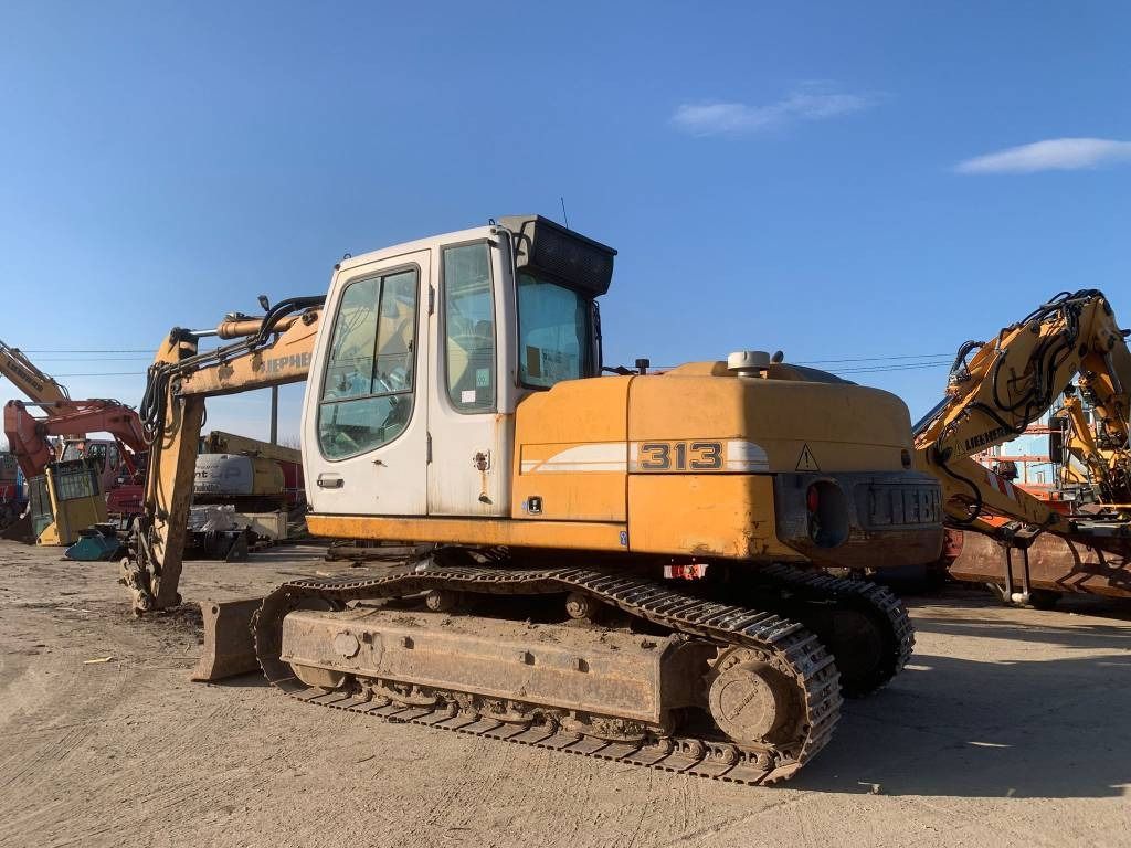 2008 Liebherr R313 crawler excavator, rear three-quarter view 2008 Liebherr R313 crawler excavator, rear three-quarter view