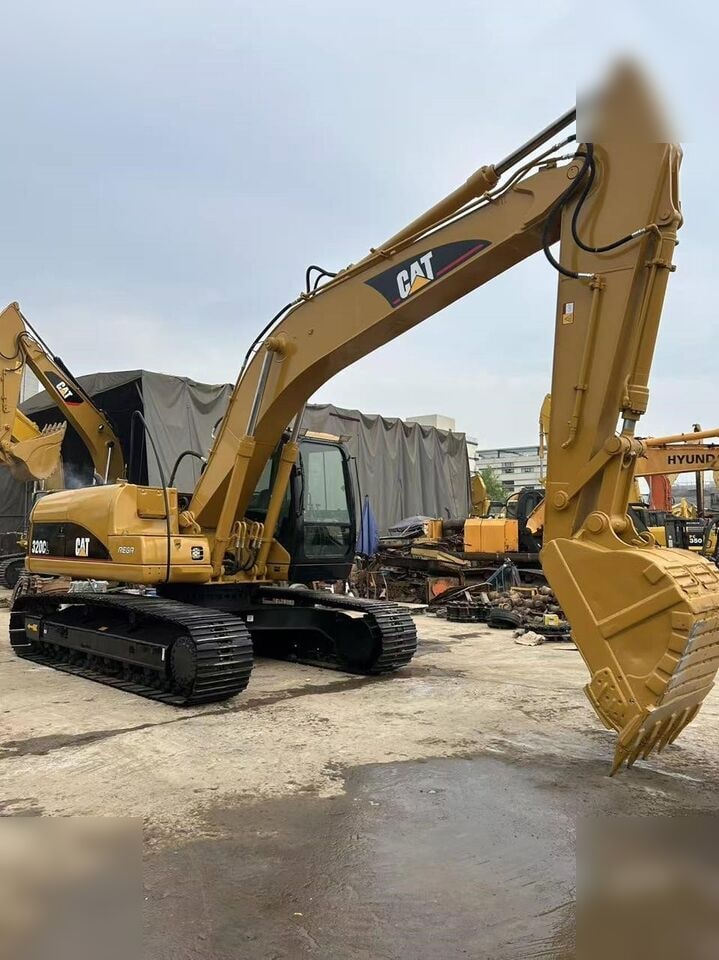 Pelle sur chenilles Caterpillar 320CL 2024, vue latérale Pelle sur chenilles Caterpillar 320CL 2024, vue latérale