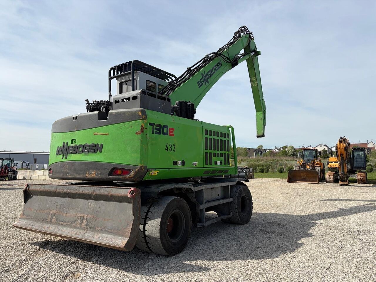 2016 Sennebogen 730E wheel excavator, rear three-quarter view