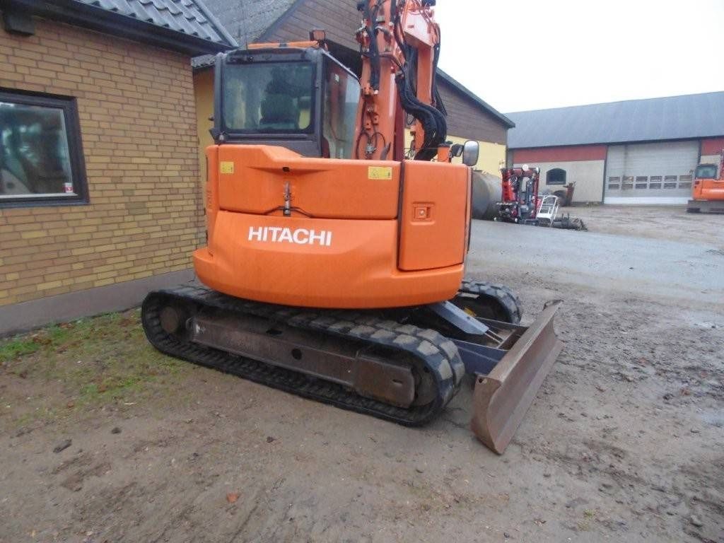 2016 Hitachi 85US mini excavator, rear three-quarter view