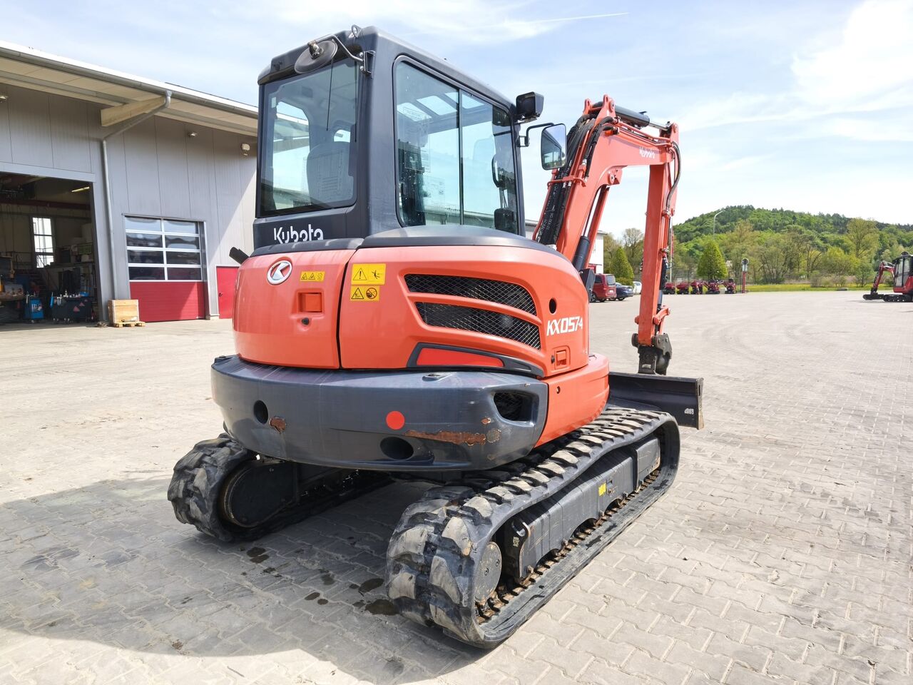 2020 Kubota KX057-4 mini excavator rear three-quarter view 2020 Kubota KX057-4 mini excavator rear three-quarter view