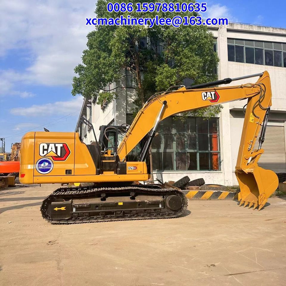 2023 Caterpillar 320GC crawler excavator, side profile view