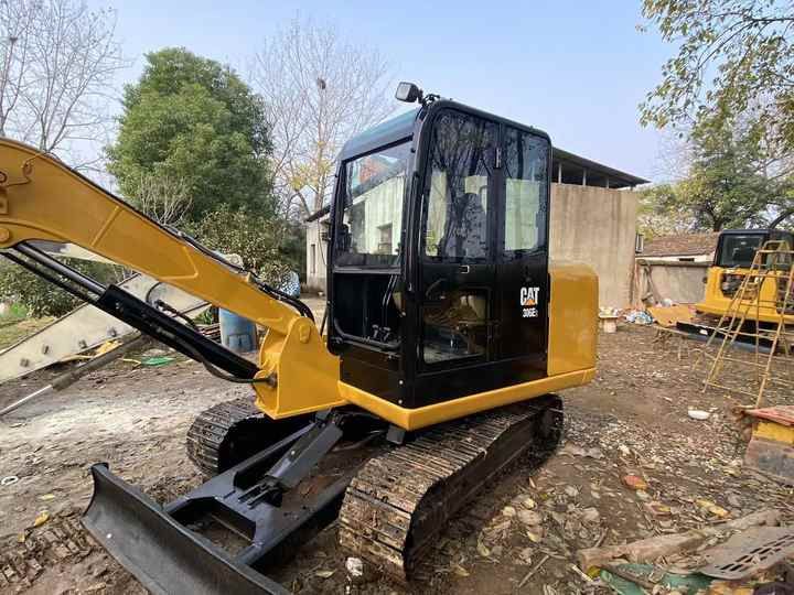 2022 Caterpillar 306E2 mini excavator, side view 2022 Caterpillar 306E2 mini excavator, side view