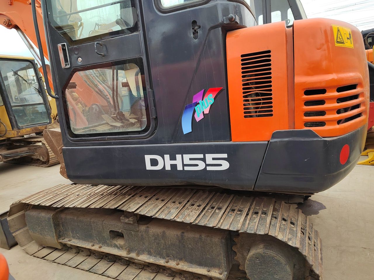 Doosan DH55 mini excavator side view