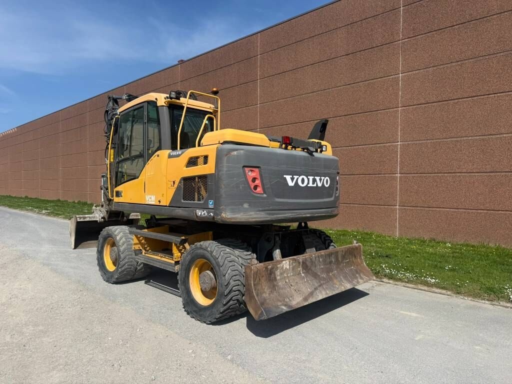2013 Volvo EW140D wheel excavator, rear three-quarter view 2013 Volvo EW140D wheel excavator, rear three-quarter view