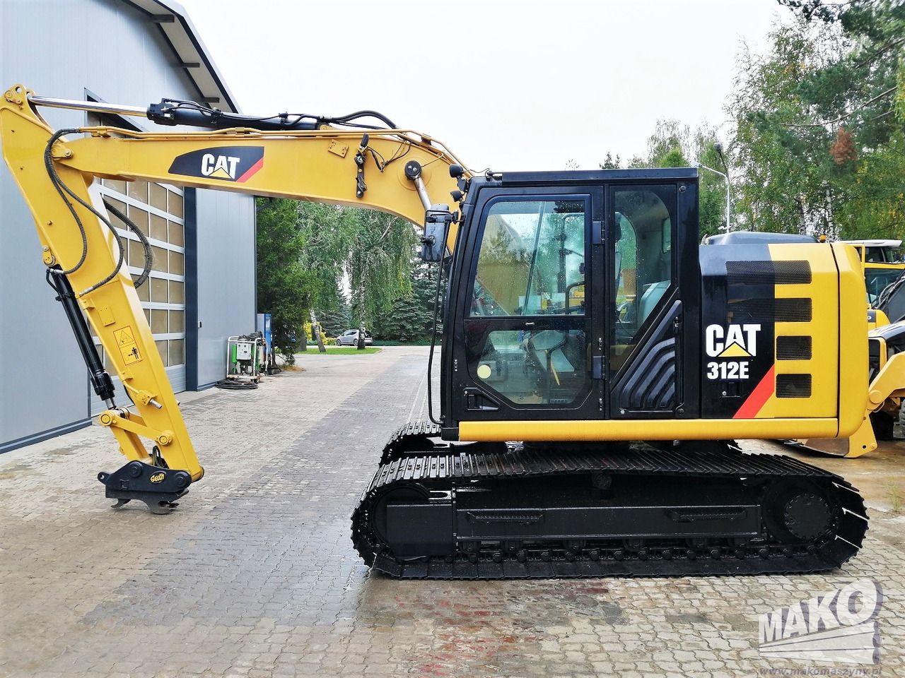 2015 Caterpillar 312E crawler excavator side view 2015 Caterpillar 312E crawler excavator side view