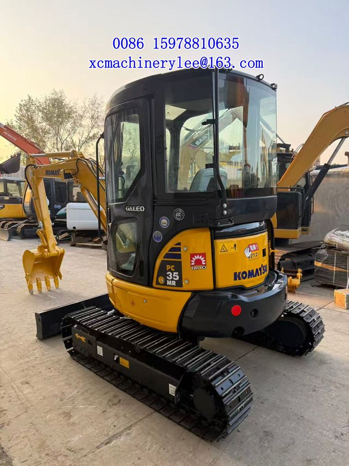 2024 Komatsu PC35 MR mini excavator, rear three-quarter view 2024 Komatsu PC35 MR mini excavator, rear three-quarter view