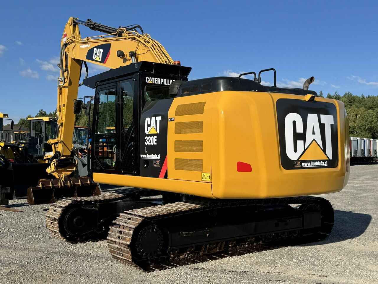 2015 Caterpillar 320EL crawler excavator, rear three-quarter view