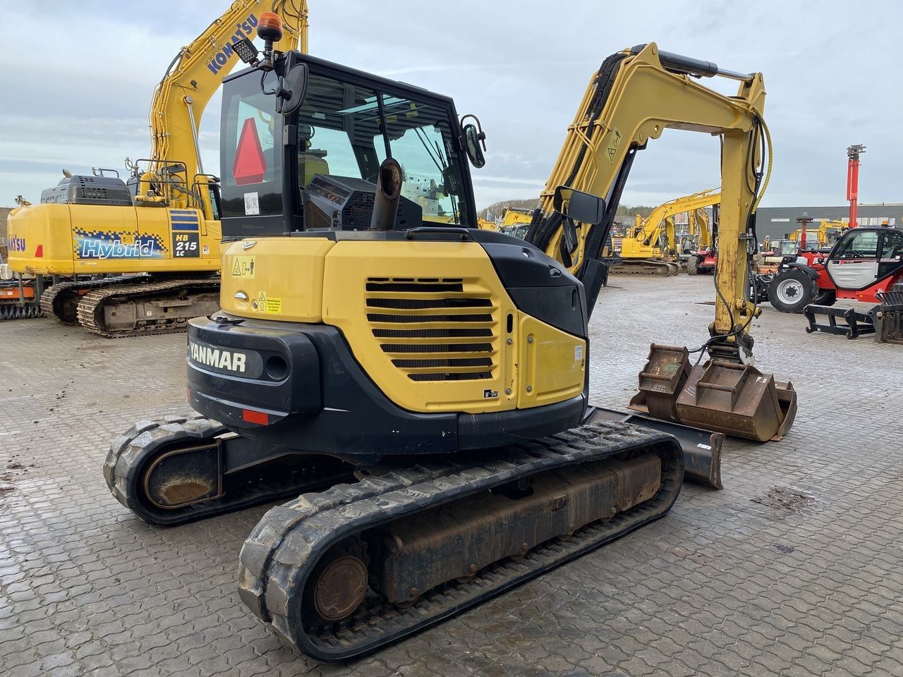 2017 Yanmar VIO80-1A mini excavator, rear three-quarter view 2017 Yanmar VIO80-1A mini excavator, rear three-quarter view