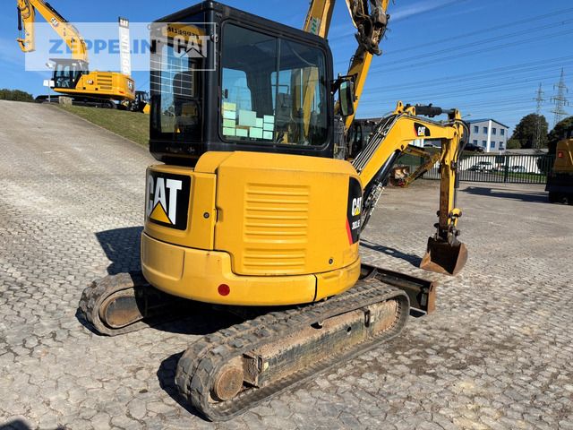 2016 Caterpillar 303.5ECR mini excavator rear three-quarter view 2016 Caterpillar 303.5ECR mini excavator rear three-quarter view