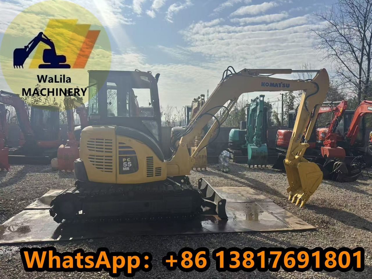 2023 Komatsu PC55MR-3 mini excavator, side view 2023 Komatsu PC55MR-3 mini excavator, side view