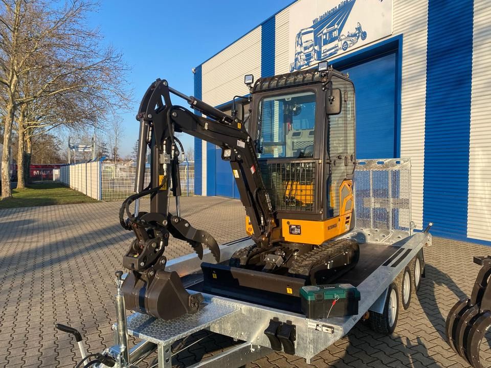 Berger Kraus BK2000NKSR mini excavator on trailer, side view Berger Kraus BK2000NKSR mini excavator on trailer, side view