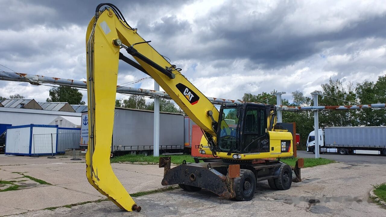 2011 Caterpillar M318D MH material handler, side profile view 2011 Caterpillar M318D MH material handler, side profile view
