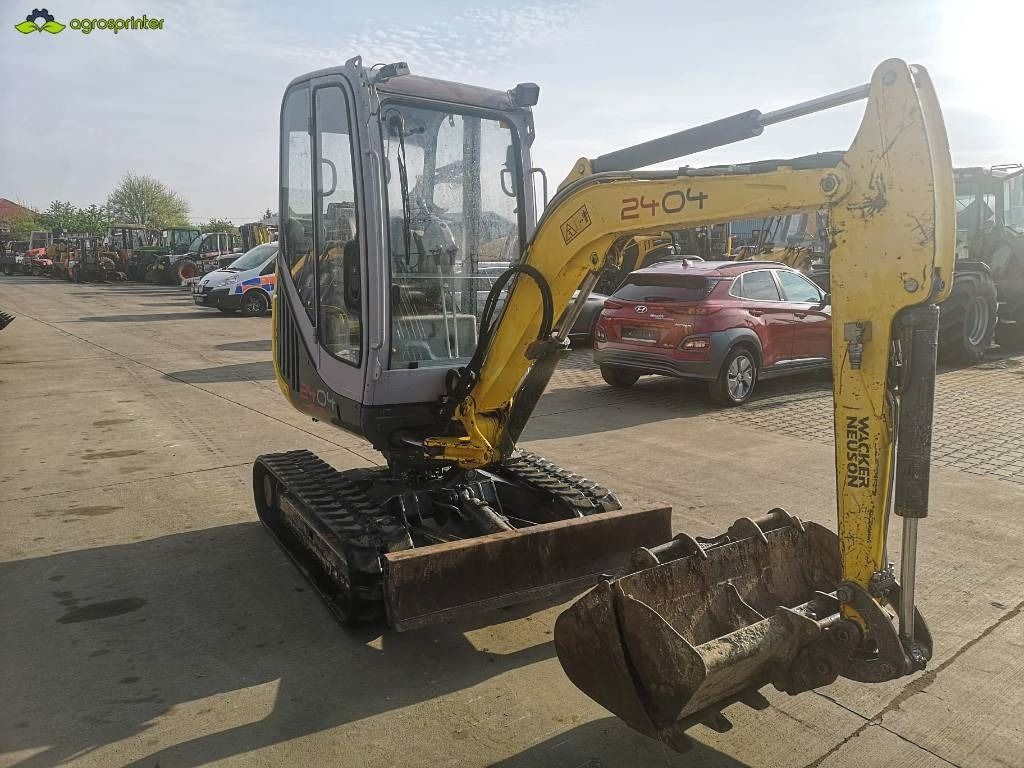 2011 Wacker Neuson 2404 mini excavator, front three-quarter view