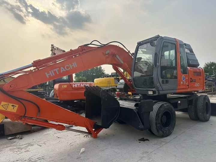 2023 Hitachi Zaxis 130 wheel excavator, side profile view