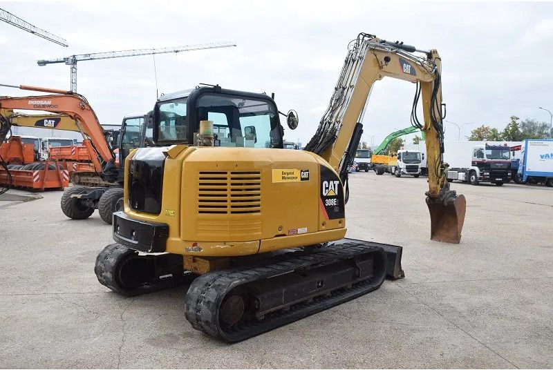 2018 Caterpillar 308E2CR mini excavator, rear three-quarter view 2018 Caterpillar 308E2CR mini excavator, rear three-quarter view