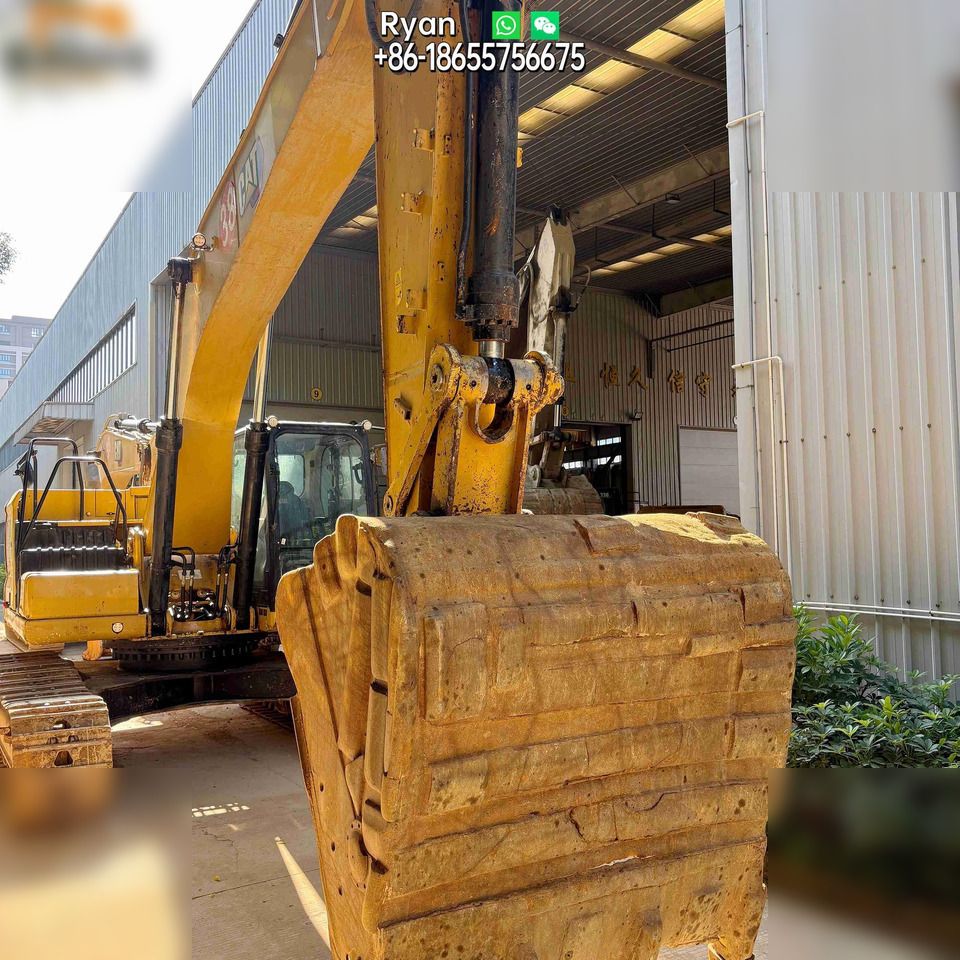 2022 Caterpillar 333 crawler excavator, close-up of bucket and boom