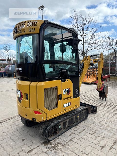2022 Caterpillar 301.8 mini excavator, rear three-quarter view
