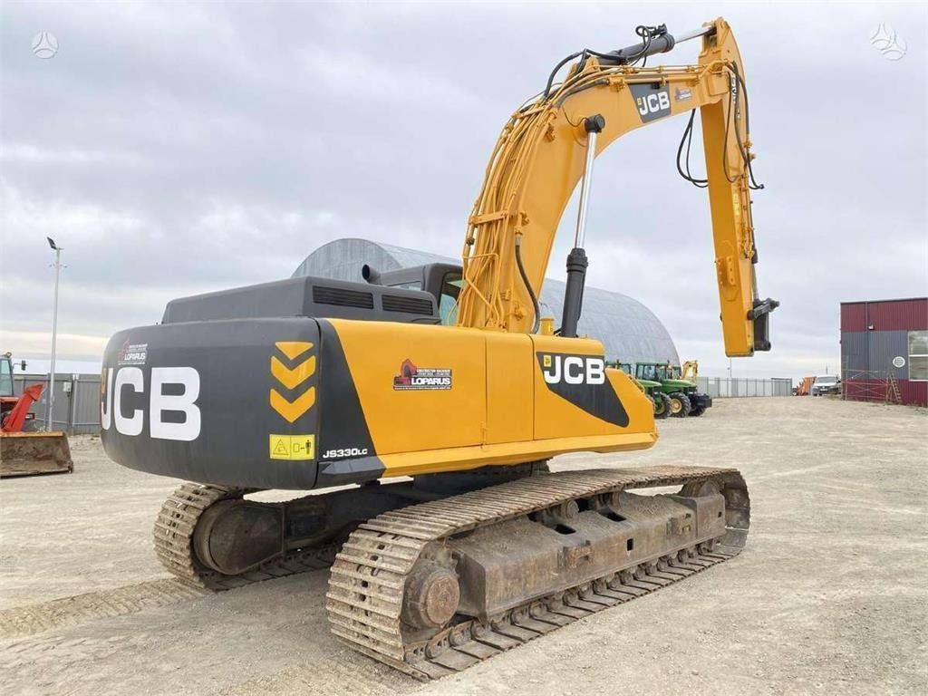 2002 JCB JS 330 LC crawler excavator rear three-quarter view 2002 JCB JS 330 LC crawler excavator rear three-quarter view