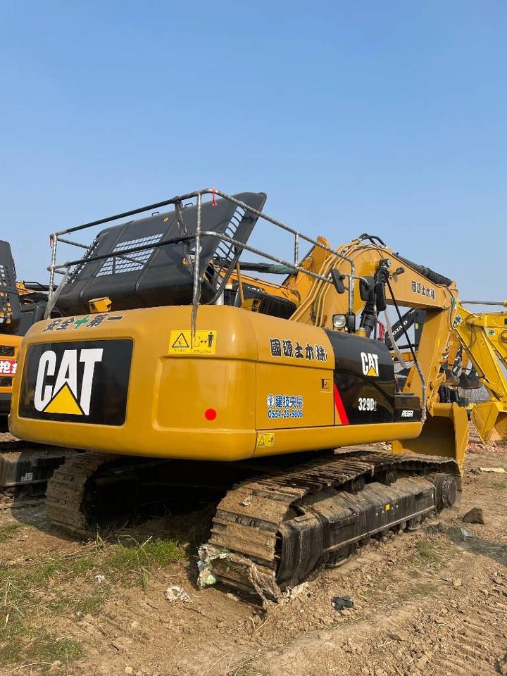 2024 Caterpillar 329D crawler excavator, rear three-quarter view
