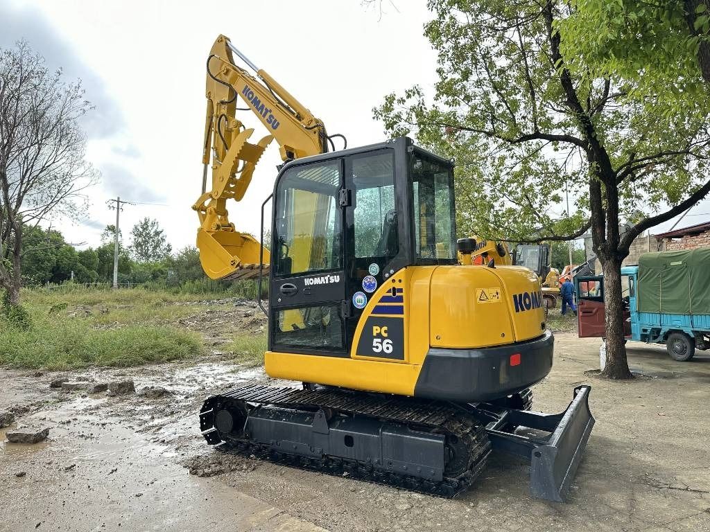 2022 Komatsu PC56-7 mini excavator, rear three-quarter view 2022 Komatsu PC56-7 mini excavator, rear three-quarter view