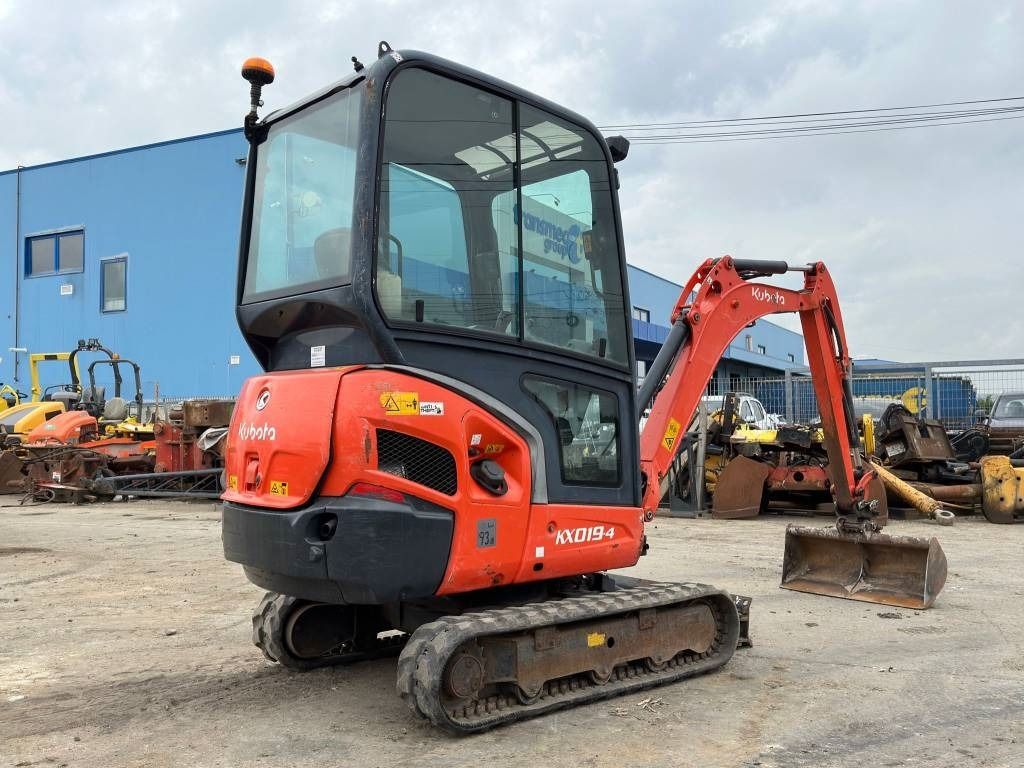 2014 Kubota KX019-4 mini excavator, rear three-quarter view