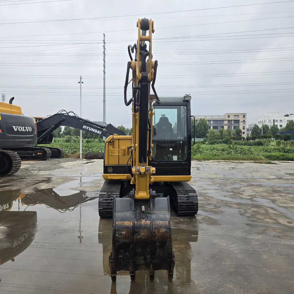 2022 Caterpillar 305.5E2 mini excavator, front view 2022 Caterpillar 305.5E2 mini excavator, front view