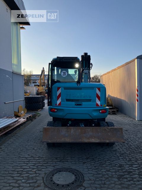 2019 Wacker Neuson ZM70 wheel excavator, rear view 2019 Wacker Neuson ZM70 wheel excavator, rear view
