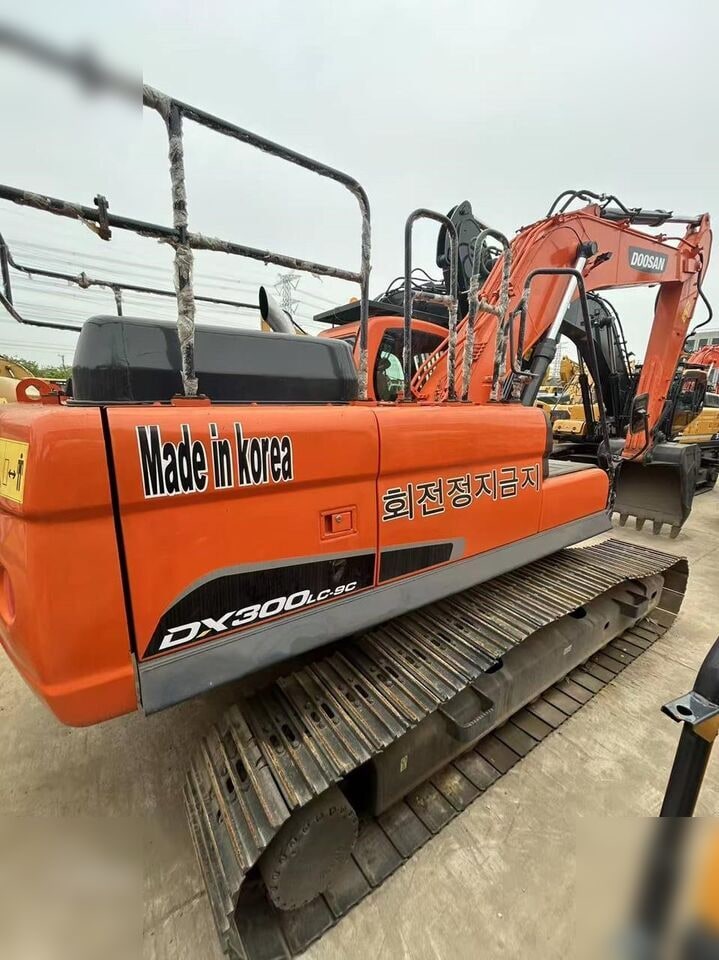 2021 Doosan DX300LC-9C crawler excavator, rear three-quarter view