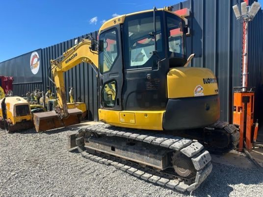 2011 Komatsu PC80MR-3 crawler excavator, rear three-quarter view 2011 Komatsu PC80MR-3 crawler excavator, rear three-quarter view