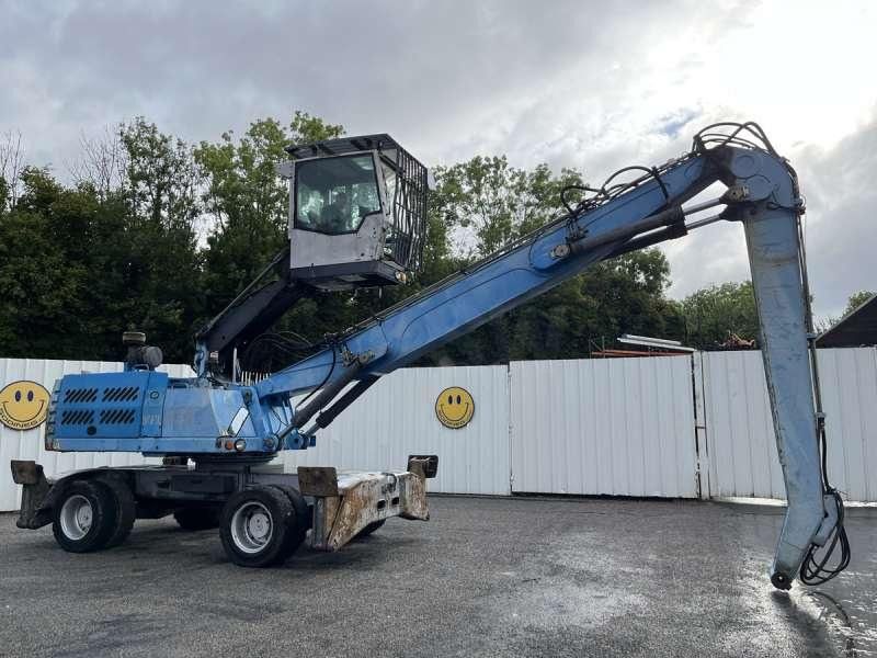 2011 Fuchs MHL335 material handler, side view