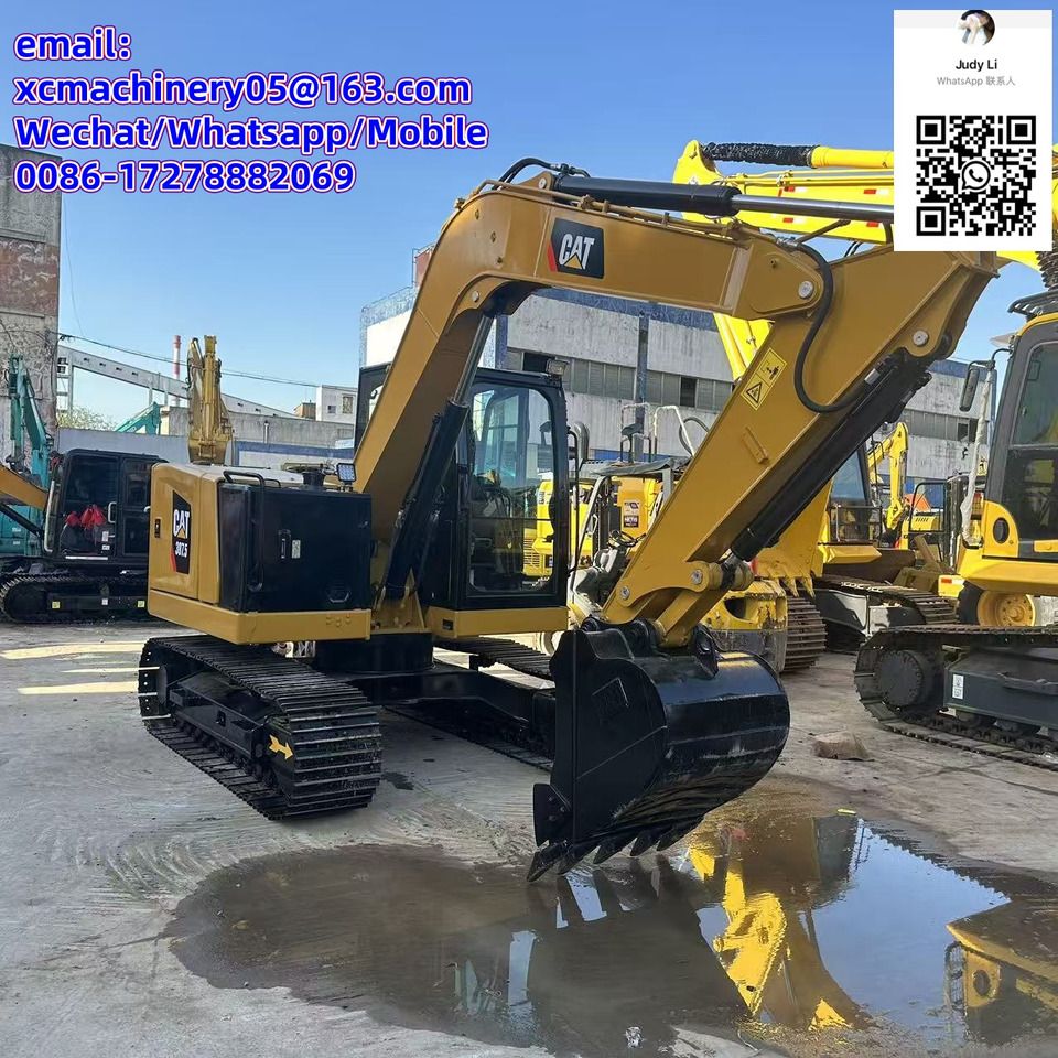 2023 Caterpillar 307.5 mini excavator, rear three-quarter view 2023 Caterpillar 307.5 mini excavator, rear three-quarter view