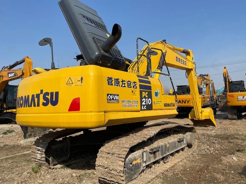 2025 Komatsu PC210LC crawler excavator, rear three-quarter view 2025 Komatsu PC210LC crawler excavator, rear three-quarter view
