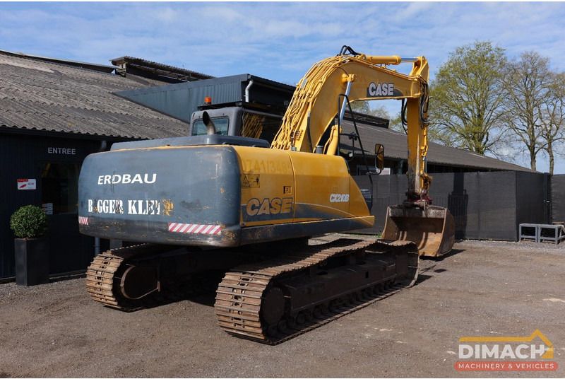 2011 CASE CX210B crawler excavator rear three-quarter view