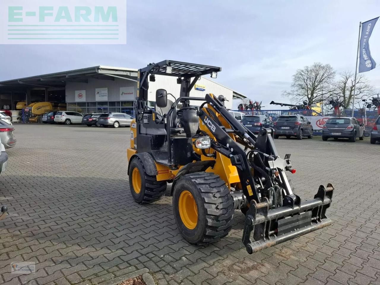2024 JCB 403PLUS wheel loader, front three-quarter view 2024 JCB 403PLUS wheel loader, front three-quarter view