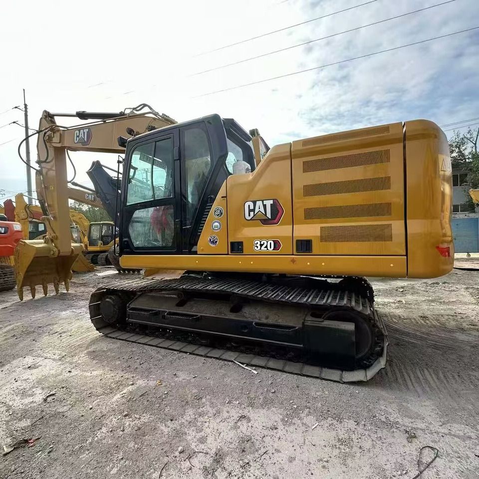 2021 Caterpillar 320GC crawler excavator, side profile view