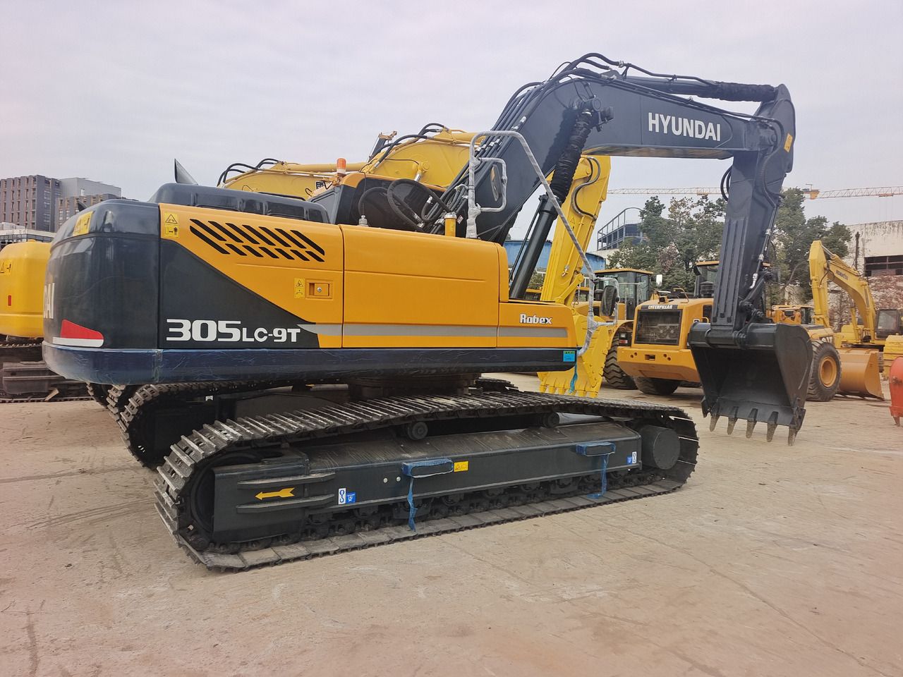 2024 Hyundai R305LC-9T crawler excavator, rear three-quarter view