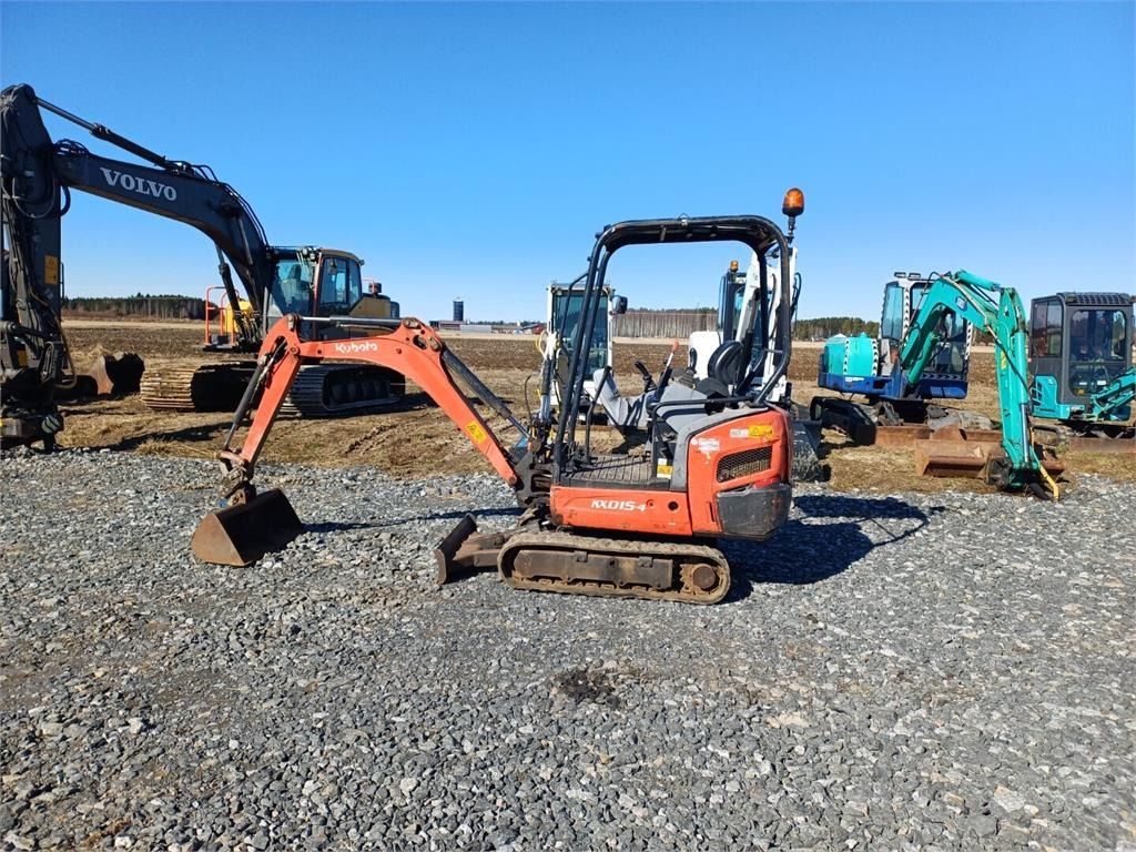2013 Kubota KX015-4 mini excavator, side view 2013 Kubota KX015-4 mini excavator, side view