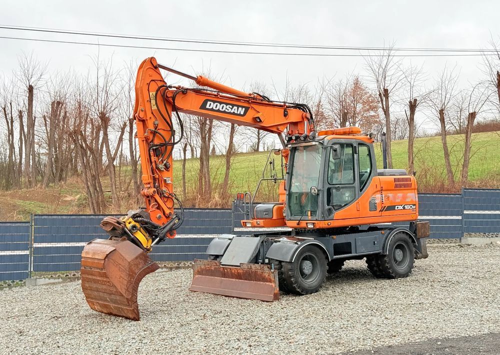2012 Doosan DX160W wheel excavator side view 2012 Doosan DX160W wheel excavator side view