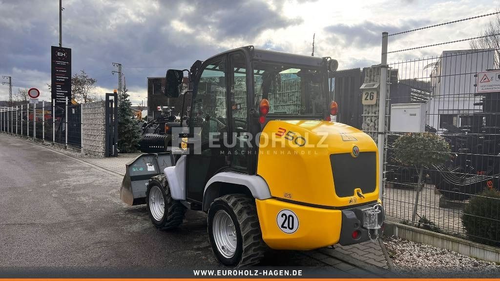 2013 Yanmar VIO25-4 mini excavator, rear three-quarter view 2013 Yanmar VIO25-4 mini excavator, rear three-quarter view