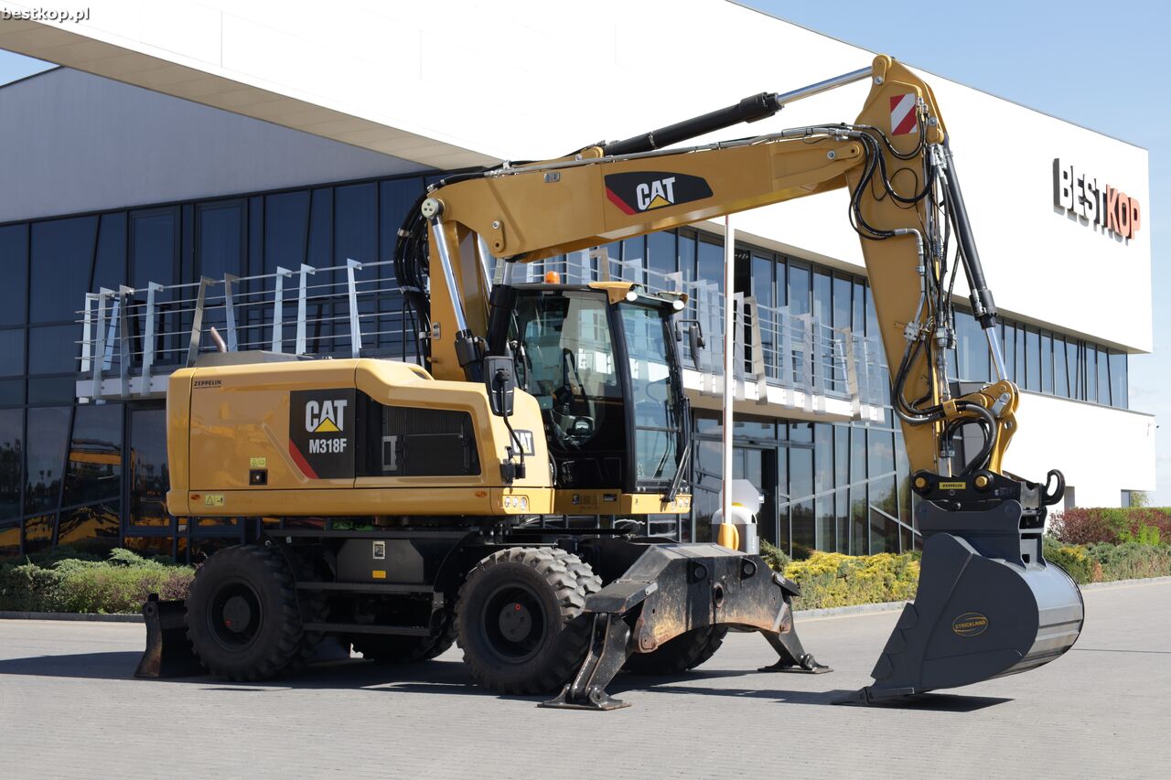 2016 Caterpillar M318F wheel excavator, side profile view 2016 Caterpillar M318F wheel excavator, side profile view