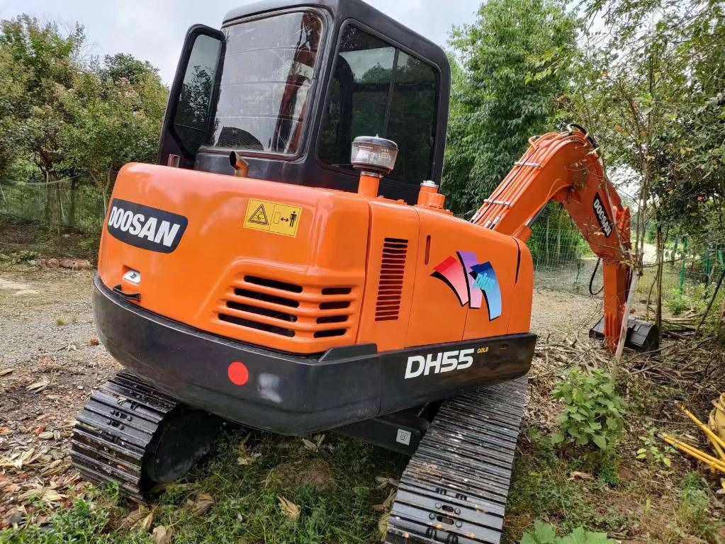 2022 Doosan DH55 mini excavator, rear three-quarter view