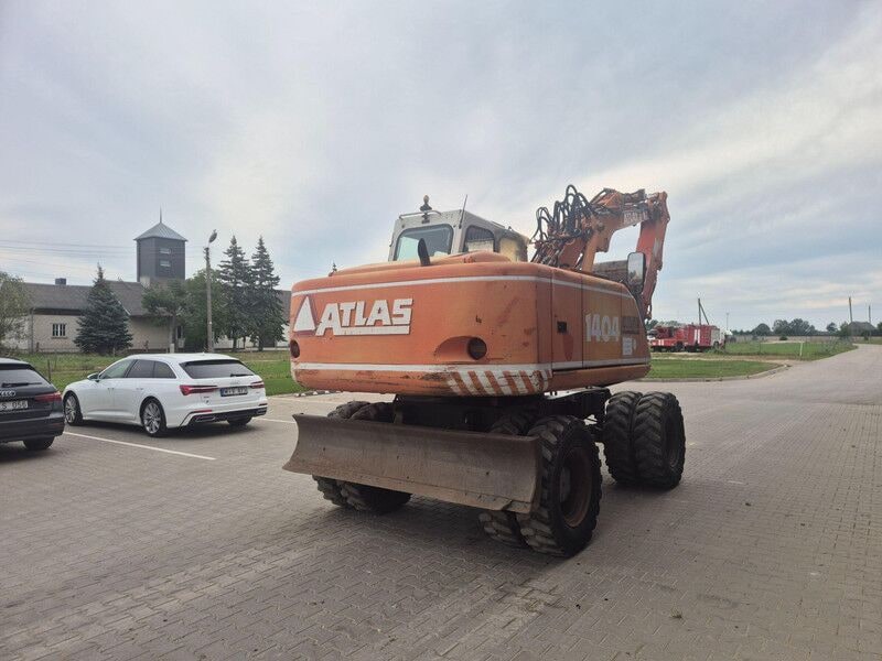 2001 Atlas 1404 wheel excavator, rear three-quarter view 2001 Atlas 1404 wheel excavator, rear three-quarter view