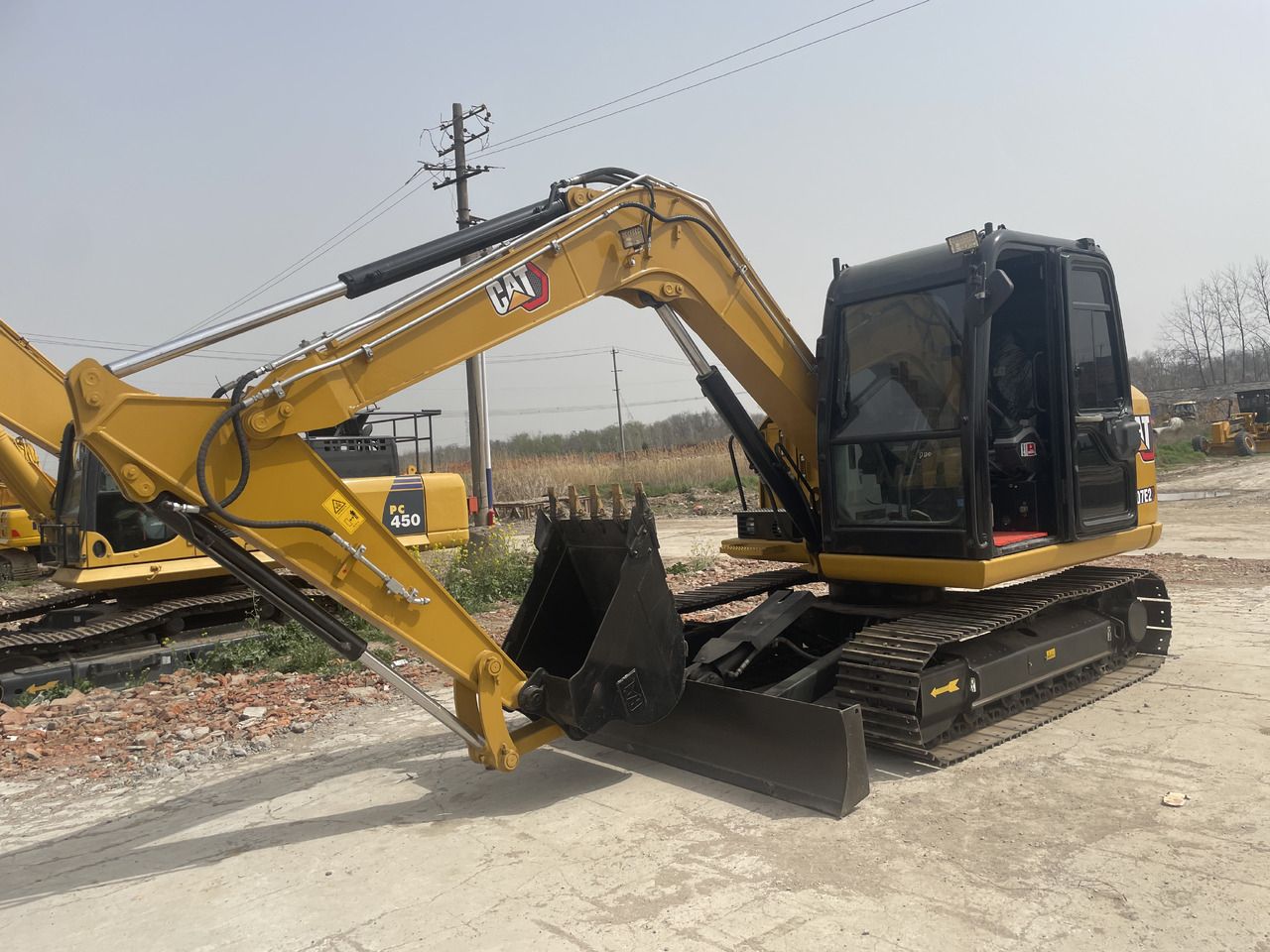 2024 Caterpillar 307E2 mini excavator, side view 2024 Caterpillar 307E2 mini excavator, side view
