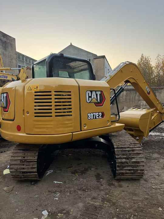 2024 Caterpillar 307E2 excavator rear three-quarter view