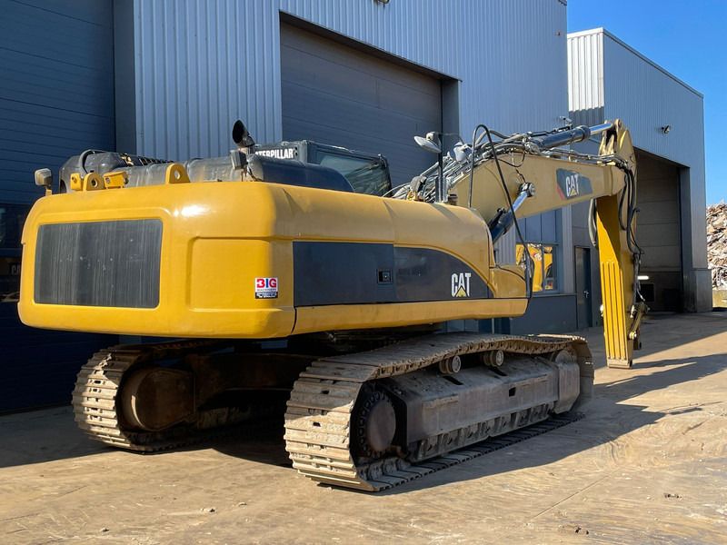 2012 Caterpillar 336D crawler excavator, rear three-quarter view 2012 Caterpillar 336D crawler excavator, rear three-quarter view